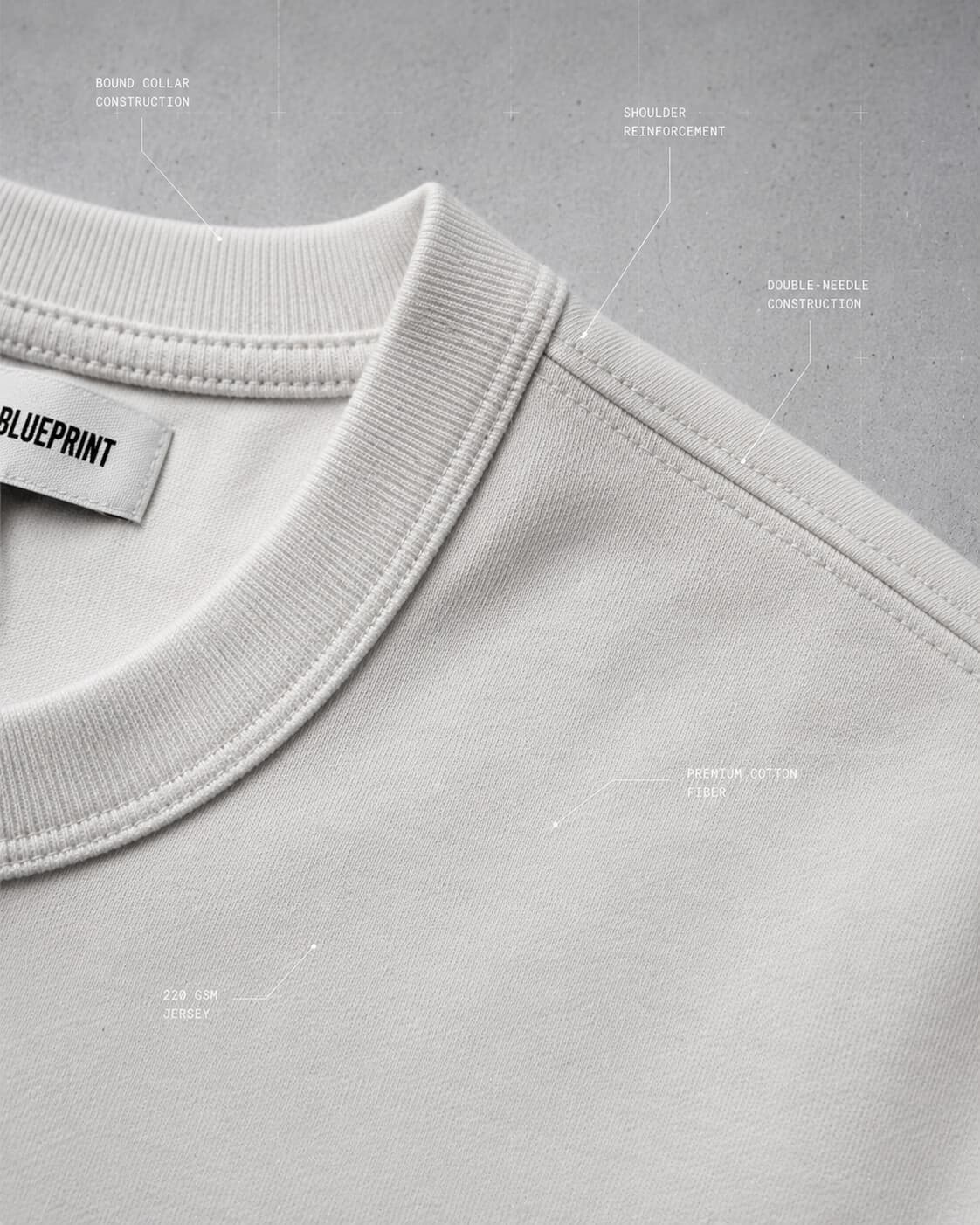 Bound rib collar and double-needle shoulder of the Registration Tee, in detail